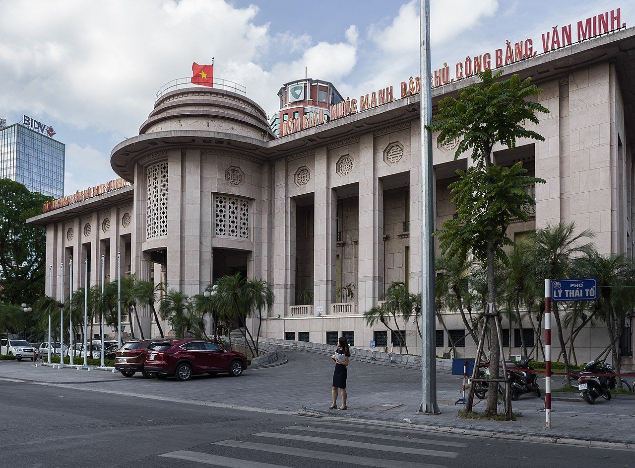 The State Bank of Vietnam headquarters at 49 Lý Thái Tổ Street in central Hanoi, a neoclassical building with a corner rotunda originally built for the French-colonial Banque de l'Indochine