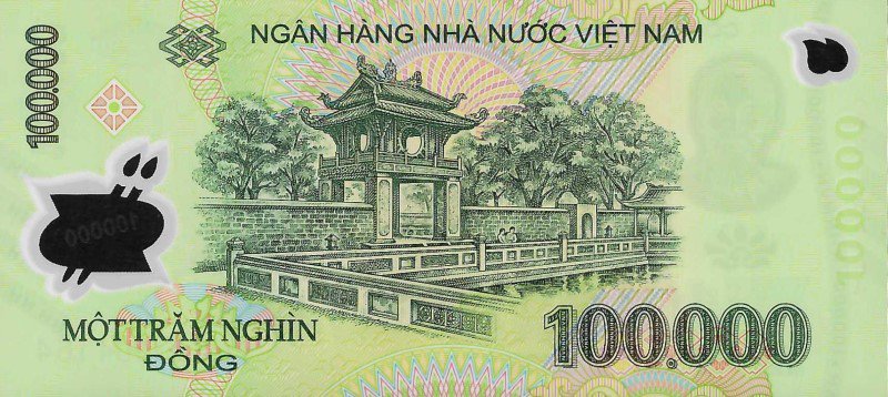 Reverse of the 100,000 đồng Vietnamese polymer banknote: detailed engraving of Khuê Văn Các, the two-storey wooden gate-pavilion with four circular upper windows, the Temple of Literature stone wall extending to either side, surrounded by trees, on a green polymer ground